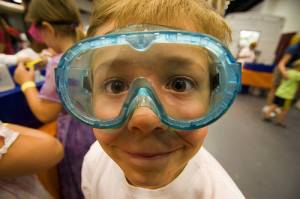 a kid in goggles.