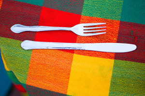 a knife and fork on a napkin
