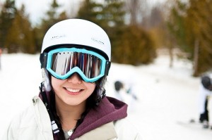 a kid in a snowboarding helmet